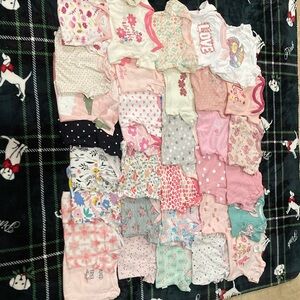 Assorted Baby Onesies in Pink and White